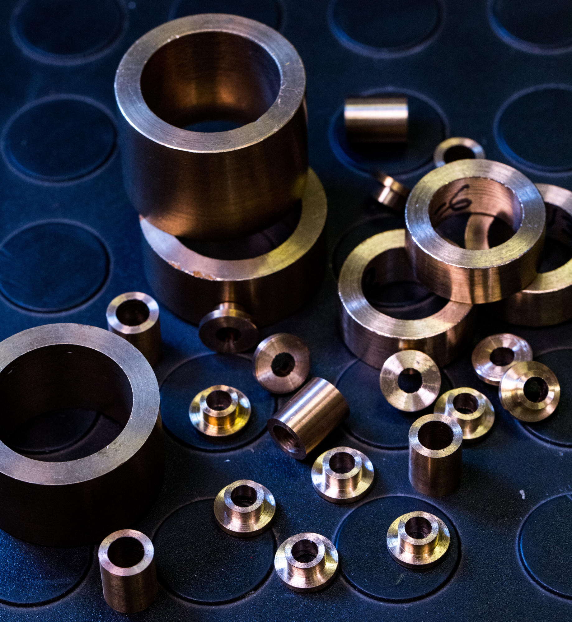 Hand holding a container with yellowish liquid