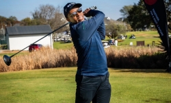 Dr Thulani Dlamini swings for a cause at the CSIR Charity Golf Day