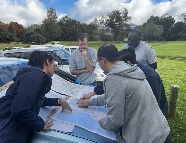 People looking at documents
