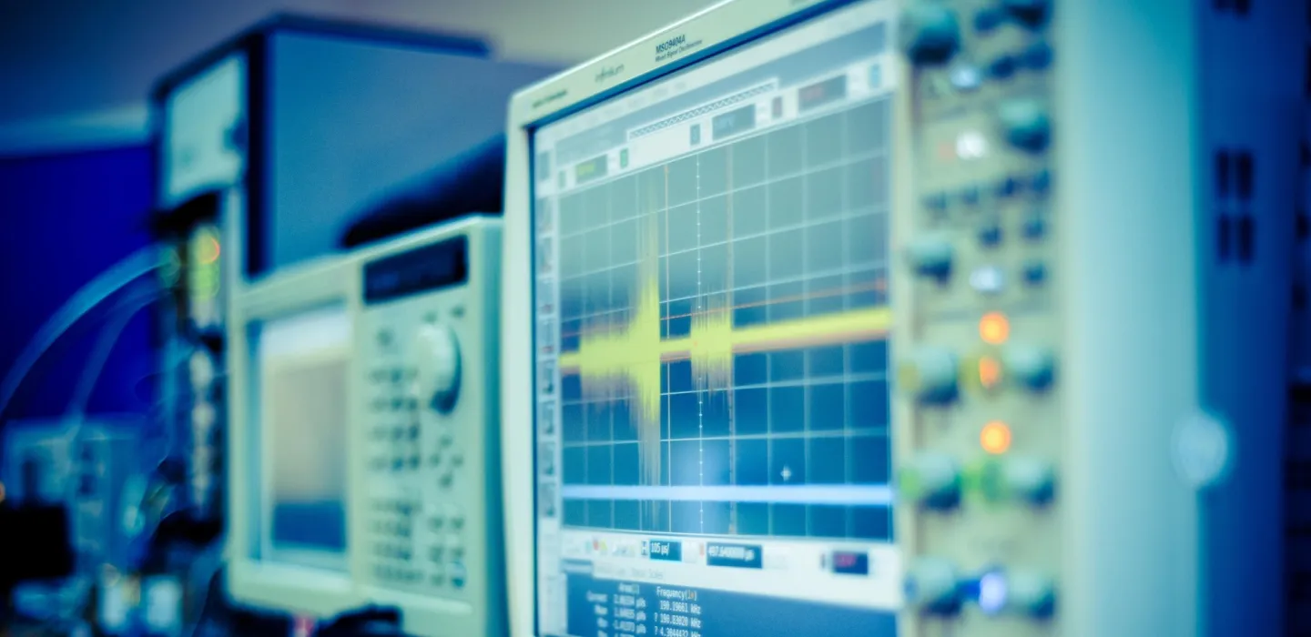 Computer screen with hand turning knob